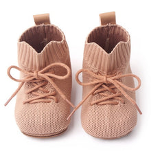 Load image into Gallery viewer, These breathable baby booties keep little feet cozy and comfortable, while allowing for natural movement. Perfect for kids newborn to 18 months, available in three colors – beige, black, and pink – these booties are a must-have for any parent! Get yours today and keep your baby&#39;s feet safe! Material: Cotton . Outsole Material: Rubber. Closure Type: Elastic Band.

