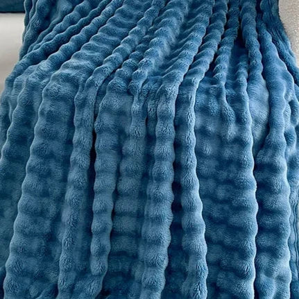 This faux fur blanket comes in 3 sizes. Wrap your child in ultimate warmth and comfort with the luxurious Blue Faux Fur Plush Blanket. Add a touch of coziness to their bedroom or playroom with this ultra soft blanket, now available in multiple sizes. It's the perfect addition to any space for a cozy and inviting atmosphere.