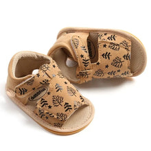 Load image into Gallery viewer, Made with soft materials and designed especially for newborns to 18 month olds, they are the perfect addition to any baby&#39;s wardrobe. Your little one will look and feel great while wearing these sandals, and you&#39;ll love the convenience of finding a quality pair of shoes that will grow with them. Don&#39;t miss out on giving your baby the best sandals for their growing feet!
