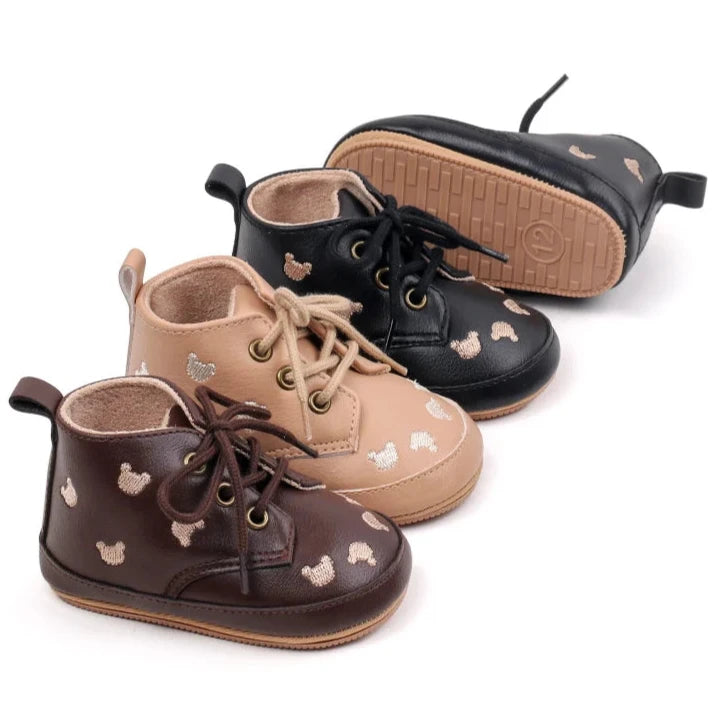 Made with the highest-quality materials, your little one's feet will stay comfortable and supported throughout their first years of growth. Available in multiple sizes, our Little Bear Baby Shoes come in a versatile palette of brown, khaki, and black, perfect for kids ages newborn to 18 months.