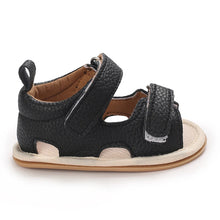 Load image into Gallery viewer, Indulge your little one in the ultimate comfort with our Valentina Baby Sandals, available in a variety of vibrant colors including green, black, white, and brown. Perfect for newborns up to 18 months, these stylish sandals are sure to make a statement and keep your baby&#39;s feet looking and feeling great..
