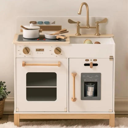 Enter the enchanting world of cooking with our play kitchen that goes beyond the basics. With genuine lights and sounds, the stove provides a captivating culinary experience for your little one. Just imagine their delight as they imitate real-life kitchen tasks, complete with crackling noises and lifelike lighting. Our kitchen stands out with its combination of fun and authenticity, transforming every playtime into a wondrous journey! Available in white and blue..