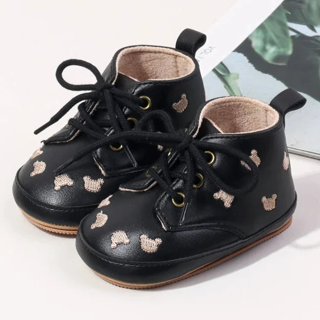 Made with the highest-quality materials, your little one's feet will stay comfortable and supported throughout their first years of growth. Available in multiple sizes, our Little Bear Baby Shoes come in a versatile palette of brown, khaki, and black, perfect for kids ages newborn to 18 months.
