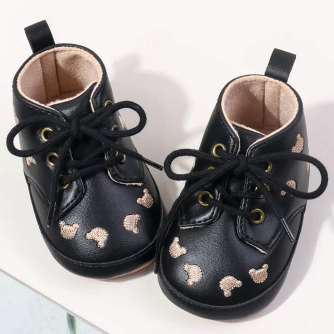 Made with the highest-quality materials, your little one's feet will stay comfortable and supported throughout their first years of growth. Available in multiple sizes, our Little Bear Baby Shoes come in a versatile palette of brown, khaki, and black, perfect for kids ages newborn to 18 months.