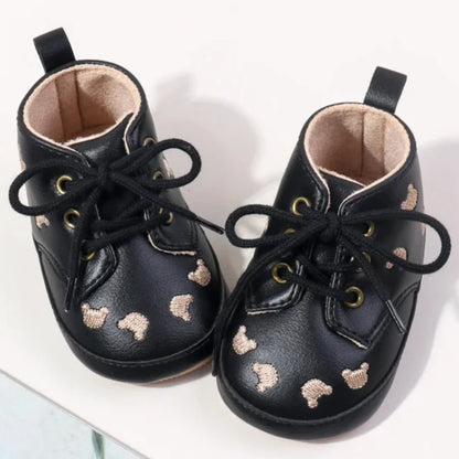 Made with the highest-quality materials, your little one's feet will stay comfortable and supported throughout their first years of growth. Available in multiple sizes, our Little Bear Baby Shoes come in a versatile palette of brown, khaki, and black, perfect for kids ages newborn to 18 months.