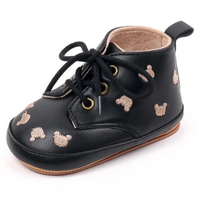 Made with the highest-quality materials, your little one's feet will stay comfortable and supported throughout their first years of growth. Available in multiple sizes, our Little Bear Baby Shoes come in a versatile palette of brown, khaki, and black, perfect for kids ages newborn to 18 months.