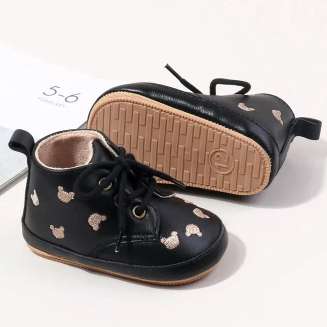 Made with the highest-quality materials, your little one's feet will stay comfortable and supported throughout their first years of growth. Available in multiple sizes, our Little Bear Baby Shoes come in a versatile palette of brown, khaki, and black, perfect for kids ages newborn to 18 months.