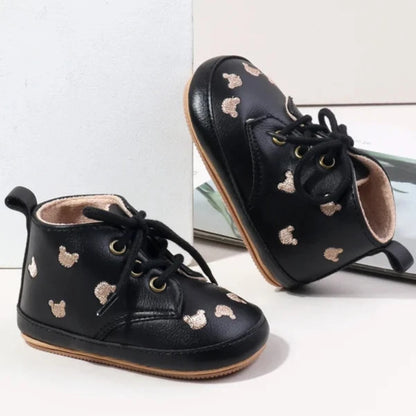 Made with the highest-quality materials, your little one's feet will stay comfortable and supported throughout their first years of growth. Available in multiple sizes, our Little Bear Baby Shoes come in a versatile palette of brown, khaki, and black, perfect for kids ages newborn to 18 months.