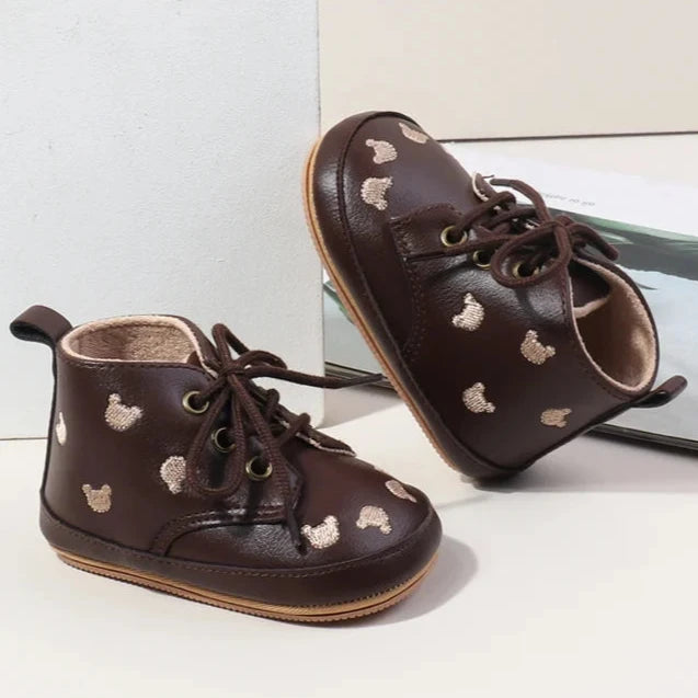Made with the highest-quality materials, your little one's feet will stay comfortable and supported throughout their first years of growth. Available in multiple sizes, our Little Bear Baby Shoes come in a versatile palette of brown, khaki, and black, perfect for kids ages newborn to 18 months.
