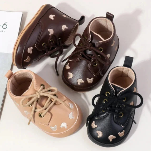 Made with the highest-quality materials, your little one's feet will stay comfortable and supported throughout their first years of growth. Available in multiple sizes, our Little Bear Baby Shoes come in a versatile palette of brown, khaki, and black, perfect for kids ages newborn to 18 months.