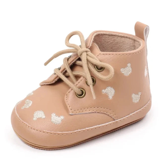 Made with the highest-quality materials, your little one's feet will stay comfortable and supported throughout their first years of growth. Available in multiple sizes, our Little Bear Baby Shoes come in a versatile palette of brown, khaki, and black, perfect for kids ages newborn to 18 months.