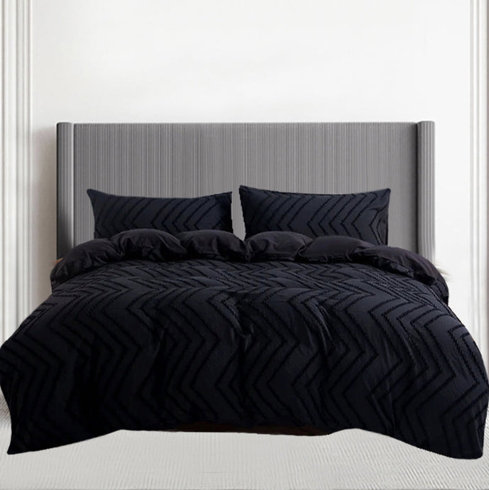 Discover the ultimate Black Geometric Bedding Set, available in multiple sizes, to elevate your child's bedroom. It includes one duvet cover and two pillow cases, with a durable and easy-to-clean linen fabric. Personalize the perfect fit by measuring your current duvet cover. Duvet and pillow inserts not included. Crafted from 100% linen material, this set exudes luxury and style.