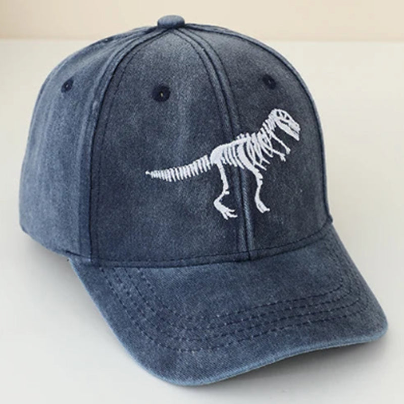 Show off your child's love for dinosaurs and add a playful touch to their outfits with the Kid's Dino Baseball Hat. With its vibrant colors and eye-catching design, your child will make a statement wherever they go. Not only will they look cool, but they'll also stay protected from the sun with its wide brim. Give your child the ultimate dino-inspired accessory today!