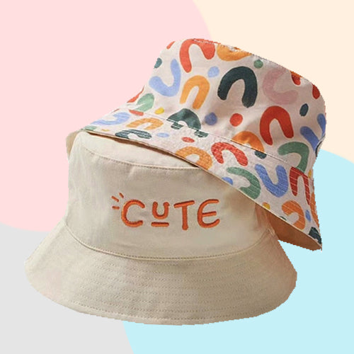 Cute two-sided beige and rainbow bucket hat. Just turn the hat around to create a different look for your child. This hat comes in 4 sizes. Strap Type: Adjustable. Material: Cotton and Polyester.    Head Circumference   18.89 inches (48cm) - Approximately 18 months to 3 years  19.68 inches(50cm) - Approximately 3 to 4 years   20.47 inches (52cm) - Approximately 4 to 5 years  21.25 inches (54cm) - Approximately 6 to 7 years