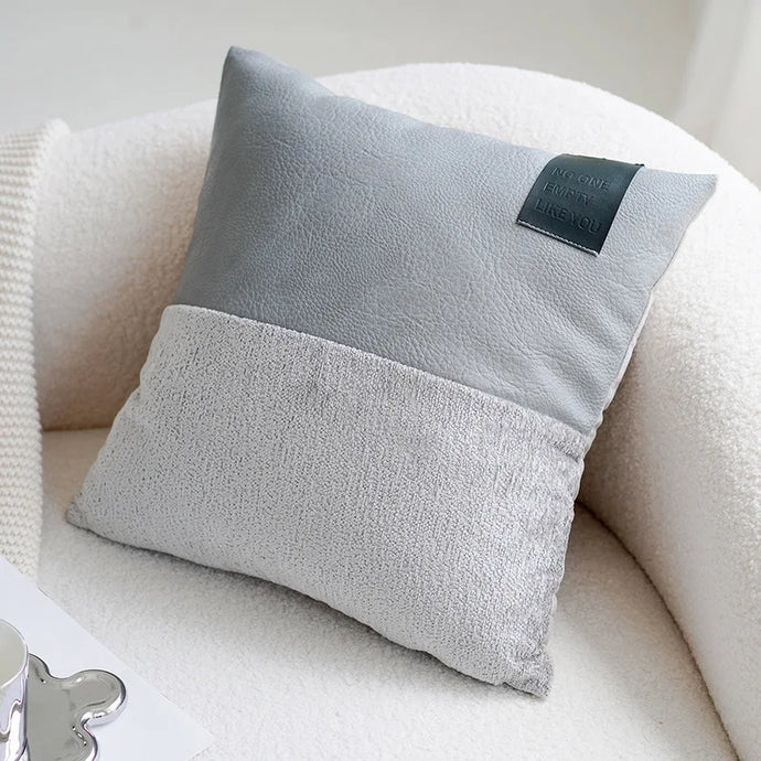 Transform your child's bedroom or playroom with our Grey Two Tone Pillow, bringing a modern touch of style and comfort to their space. With its neutral color palette and contemporary design, this pillow will elevate their room and provide a cozy and comfortable haven for lounging and playtime.