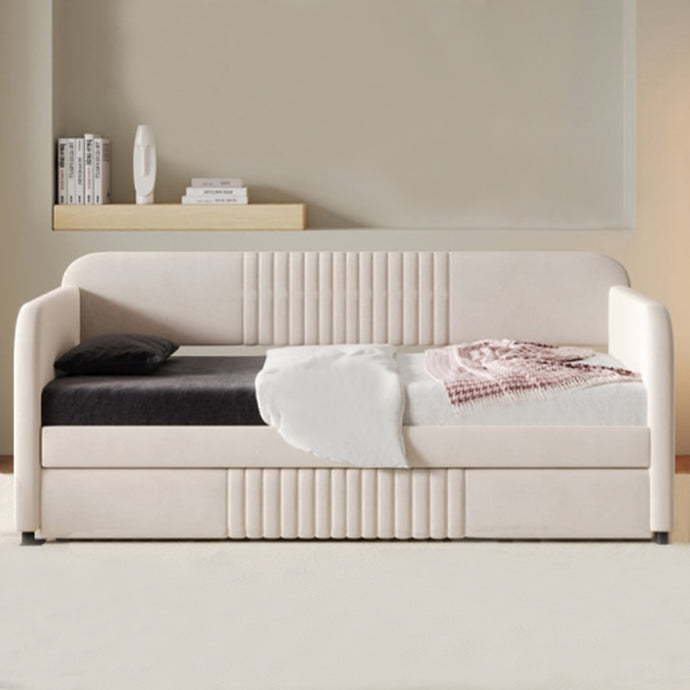 Transform your kids' bedroom into a stylish and comfortable sleepover space with this luxurious off-white daybed with trundle bed. Upholstered in velvet fabric and boasting a timeless design, its strong plywood frame provides reliable stability and durability. With the included slat kit and trundle bed, no box springs are required and you can enjoy extra sleeping space for guests. Let this timeless piece of furniture add a touch of sophistication to your home!