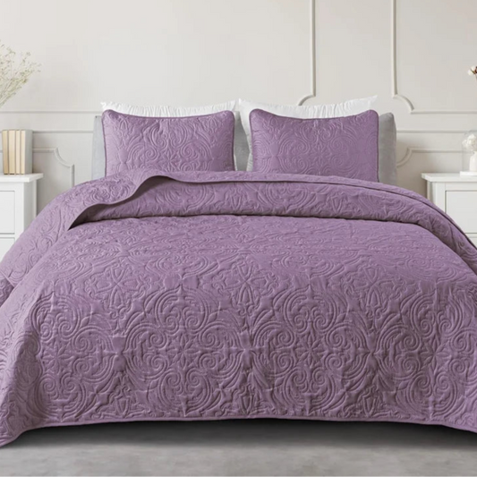 Enhance the look and feel of your kid's or teen's bedroom with this elegant lavender quilt bedding set. Featuring embossed patterns, it adds a touch of sophistication to their space while creating a cozy and stylish atmosphere.