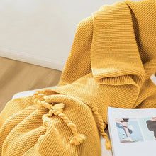 Load image into Gallery viewer, Delight in soft comfort with this luxurious mustard yellow knitted throw blanket! Perfectly light and delightfully cuddly, your little one will love snuggling up with this cozy and stylish addition to their bedroom. Make every bedroom searching session a warm and inviting one!  Size: 50 x 62 inches (130cm x 160cm). Material: 100% high quality acrylic.  Machine wash colors separately wash in cold water, gentle cycle, tumble dry low, low iron.
