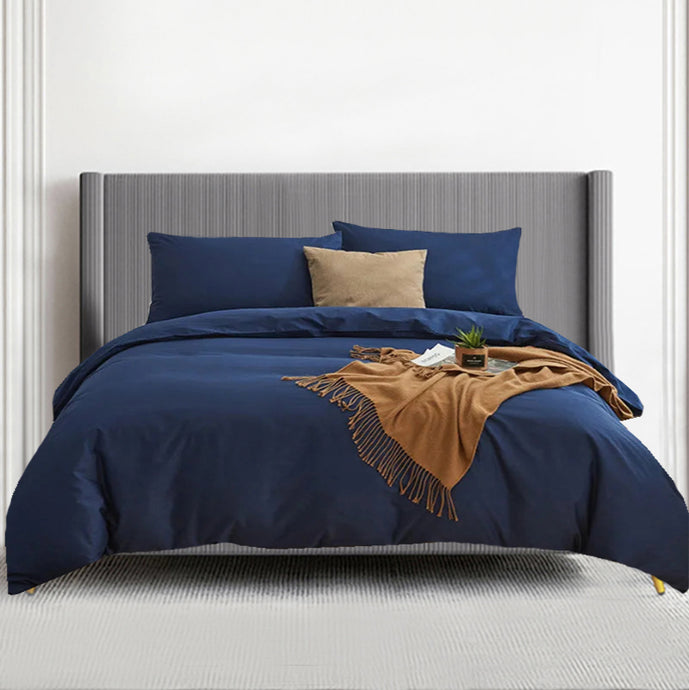 Transform your child's bedroom with our Navy Blue Duvet Cover Set, available in multiple sizes. Keep it clean effortlessly - simply measure your current duvet cover to ensure the perfect fit. Our set is machine-washable and won't fade or shrink, even after repeated washings. Wash it at a low temperature of 30 degrees, without bleach, and tumble dry on a low setting. Make a statement with this timeless and durable duvet cover set, perfect for any room decor.