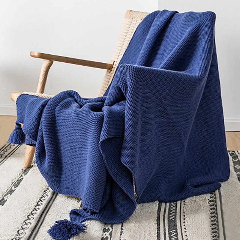 Cozy up your little one with this super comfortable navy blue throw blanket. Knitted from the softest materials, its luxurious texture will have your kids dreaming peacefully. Make bedtime extra special with this delightful blanket. Cuddle up and enjoy sweet dreams!  Size: 50 x 62 inches (130cm x 160cm) Material: High Quality Acrylic Machine wash colors separately wash in cold water, gentle cycle, tumble dry low, low iron