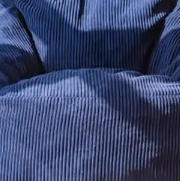 Amazing navy-blue corduroy bean bag chair for your little one's room or play space! Filled with top-notch, dense, and resilient memory foam, this bean bag couch provides excellent support and a cozy sitting experience. These foam bean bag chairs are super sturdy and keep their shape even after lots of use!