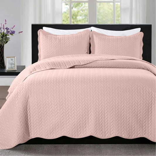 Enhance the look and feel of your kid's or teen's bedroom with this elegant peach pink quilt bedding set. Featuring embossed patterns, it adds a touch of sophistication to their space while creating a cozy and stylish atmosphere.
