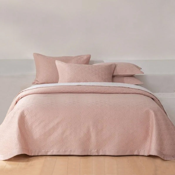 For a comfortable and elegant touch to your little one's room, take a look at our pink Tencel Bedspread. Crafted from smooth and luxurious tencel, this queen size 3-piece bedspread provides both coziness and fashion.