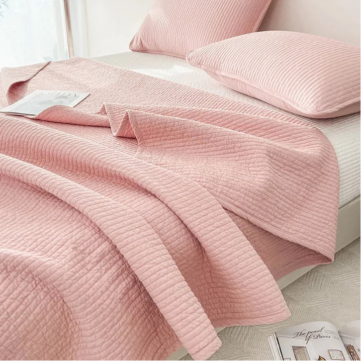 This premium pink quilt, crafted from 100% cotton with intricate embroidery, is perfect for enhancing your child's bedroom. Available in twin, full, queen, and king sizes, it offers both comfort and style tailored to your needs.