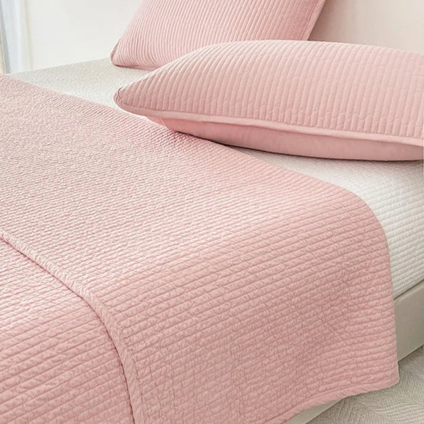 This premium pink quilt, crafted from 100% cotton with intricate embroidery, is perfect for enhancing your child's bedroom. Available in twin, full, queen, and king sizes, it offers both comfort and style tailored to your needs.