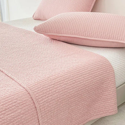 This premium pink quilt, crafted from 100% cotton with intricate embroidery, is perfect for enhancing your child's bedroom. Available in twin, full, queen, and king sizes, it offers both comfort and style tailored to your needs.