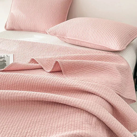 This premium pink quilt, crafted from 100% cotton with intricate embroidery, is perfect for enhancing your child's bedroom. Available in twin, full, queen, and king sizes, it offers both comfort and style tailored to your needs.
