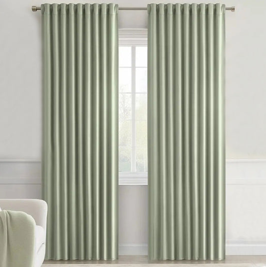 These Sage Green curtain panels are perfect for your child's bedroom or playroom. Measuring 52 inches wide and 84 inches long, they can easily complement any decorative theme to add a touch of modern elegance to your space.