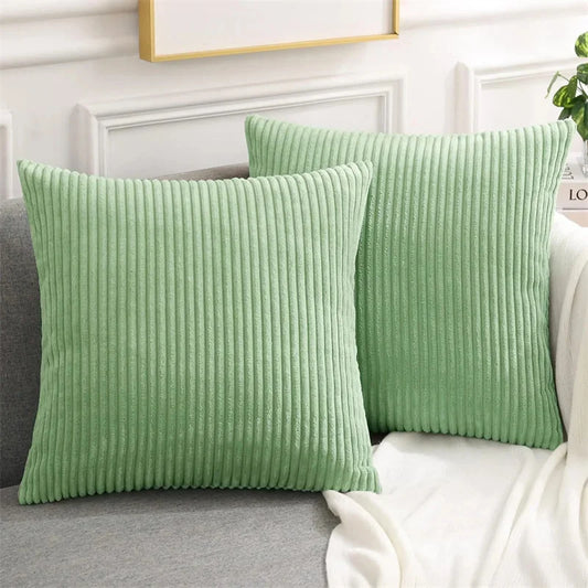Get your kids' bedroom or playroom looking fresh and funky with this Sage Green Corduroy Pillow Cover. These decorative throw pillow covers are crafted from fluffy flannel fabric on both sides, ensuring a luxuriously cozy and cuddly feel. Say hello to comfort and style with this one-of-a-kind accent piece.