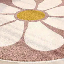 Load image into Gallery viewer, This vibrant, modern pink and white daisy rug will bring a cheerful touch to your child&#39;s playroom. Crafted from durable polyester fibers, it&#39;s soft to the touch and perfect for creating a cozy atmosphere. The perfect companion for your little one&#39;s bedroom or cloakroom, this kids&#39; carpet will add a touch of fun and style to your home.
