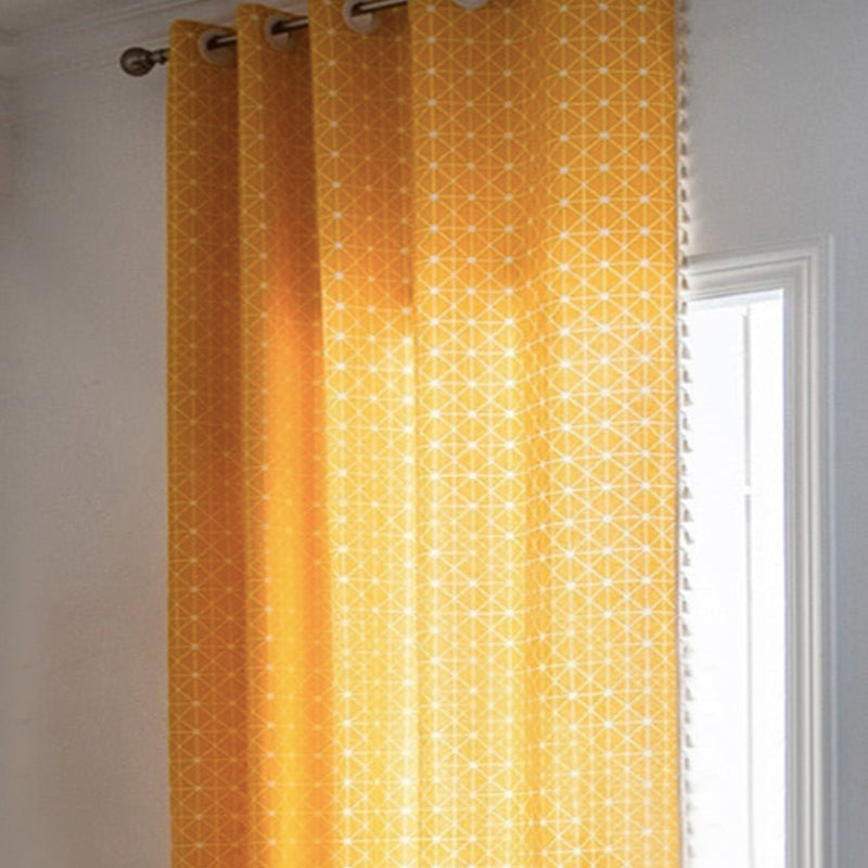 Transform any room in your home with this vibrant yellow geometric tassel curtain panel (1)! Woven from cotton and polyester, this one-of-a-kind curtain adds texture and depth with its stunning tassel pattern. Choose between a grommet, pull pleated or hook hanging application for easy setup. With its light-filtering yarn-dyed shading rate (41%-85%), there's no need to worry about total blackout! Experience its beauty and add a unique twist to your decor now!