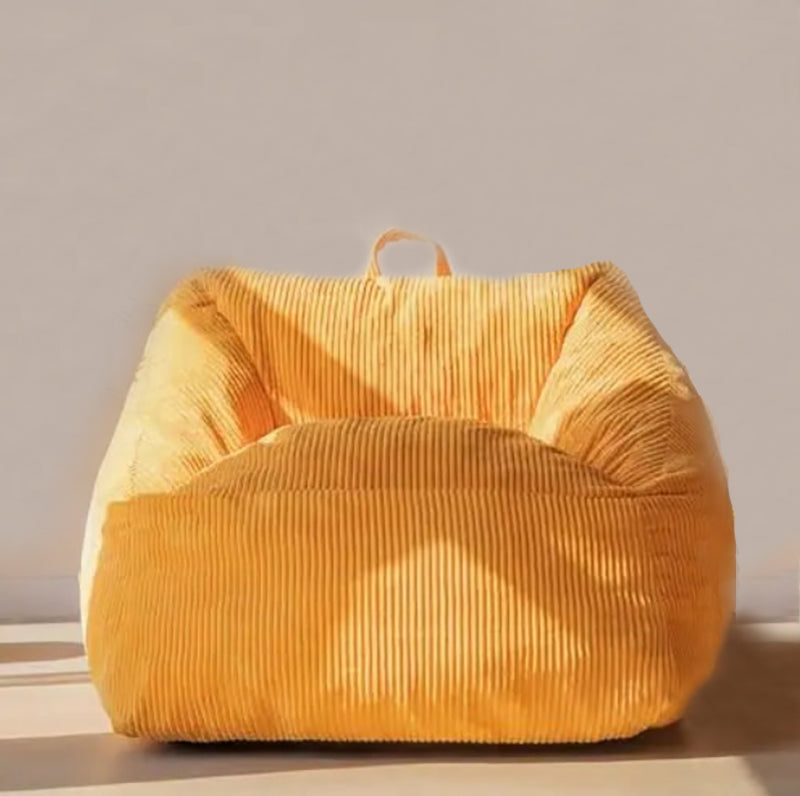 Unleash the fun with this awesome yellow bean bag chair for your kiddo's room or play space! Packed with top-notch, dense, and resilient memory foam, this bean bag offers unbeatable support for a comfy sit. Its sturdy construction ensures long-lasting shape and durability.