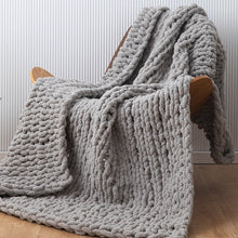 Load image into Gallery viewer, Wrap your kid in the warmth and comfort of this soft, knitted grey throw. Perfect for snuggling in the bedroom, its cozy texture will inspire sweet dreams. Enjoy a peaceful night knowing your kids are peacefully cuddled up. So, make their bedtime extra special with this delightful blanket!
