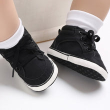 Load image into Gallery viewer, Cool black high-top sneaker for your bay age newborn to 18 months. These cotton sneakers come in grey, black, khaki and blue.
