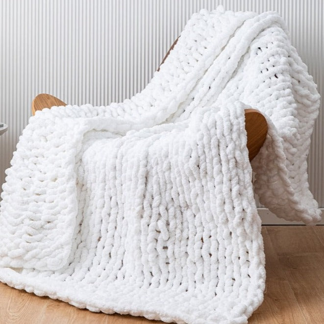 Soft and cozy white knitted blanket for your kid's bedroom. Size: 50 x 62 inches (130cm x 160cm). Material: 00% high quality acrylic. Machine wash colors separately wash in cold water, gentle cycle, tumble dry low, low iron.