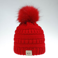 Load image into Gallery viewer, Keep your kid warm with this red beanie hat. Great for children age 1 to 7 years. This knitted cotton hat comes in red, yellow, beige, pink, black, white and grey.

