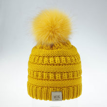 Load image into Gallery viewer, Keep your kid warm with this yellow beanie hat. Great for children age 1 to 7 years. This knitted cotton hat comes in red, yellow, beige, pink, black, white and grey.
