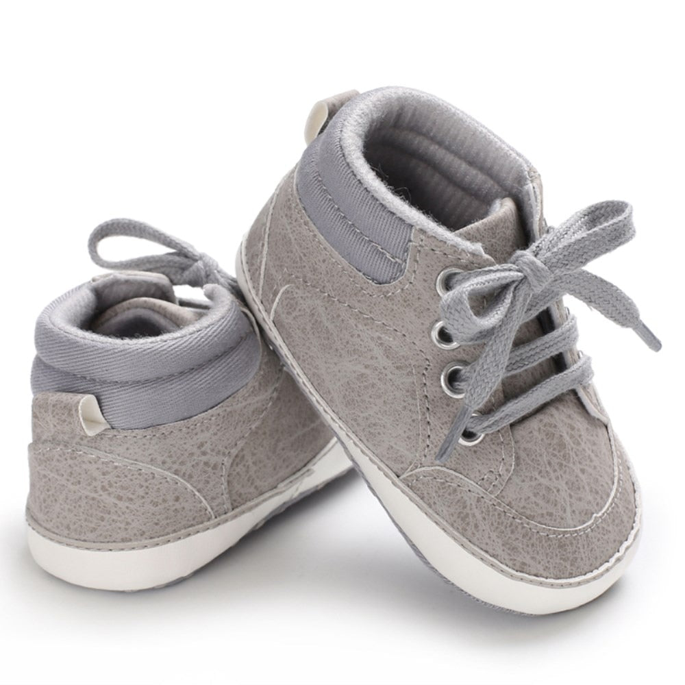 Cool grey high-top sneaker for your bay age newborn to 18 months. These cotton sneakers come in grey, black, khaki and blue.