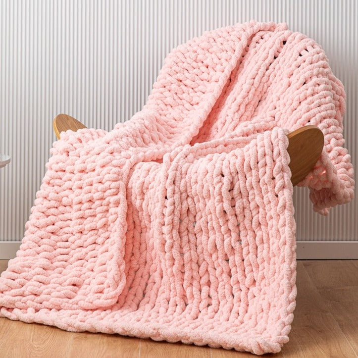 Make your kid's bedroom extra cozy with this soft and snuggly Soft Pink Knitted Throw! Not only is it cute as a button, but this knitted blanket is oh-so-huggable for limitless cuddles and snuggles. Let the comfort that comes with this snug blanket (and your little one's happy dreams) keep you warm too!  Size: 50 x 62 inches (130cm x 160cm). Material: High quality acrylic. Machine wash colors separately wash in cold water, gentle cycle, tumble dry low, low iron. 