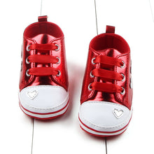 Load image into Gallery viewer, Shiny little metallic red sneakers for your baby girl age newborn to 18-months-old. Upper Material: PU. Outsole Material: Cotton. Closure Type: Lace-up. These sneakers comes in red, pink, black and gold.
