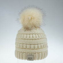 Load image into Gallery viewer, Keep your kid warm with this beige beanie hat. Great for children age 1 to 7 years. This knitted cotton hat comes in red, yellow, beige, pink, black, white and grey.
