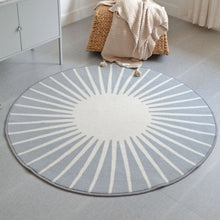Load image into Gallery viewer, This sun rug is the perfect addition to any kid&#39;s room. Delight your kids with a cool and comfortable round rug featuring a sun design in grey or yellow. Crafted from 100% polyester, it is wear-resistant and durable, plus designed with an anti-slip backing for safety.  SIZE Medium:31.49 inches (80cm) Diameter Large: 39.37 inches (100cm) Diameter X-Large:47.24 inches (120cm) Diameter 
