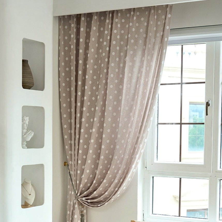 Sweet Polka dot woven curtain panel. Choose between a Grommet, Pull pleated or hook hanging application. Number of panels: 1 panel. Material: Cotton and Polyester. Pattern: Yarn Dyed. Technics: Woven.    