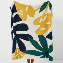 Load image into Gallery viewer, Plant some style in your kid&#39;s room with this vibrant knitted blanket! Featuring a lovely array of green, blue and yellow tropical leaves, this decorative throw is perfect for snuggling up in a jungle of cozy comfort.  Size: 51.18 x 62.99 inches (130cm x 160cm) Material: 100% cotton
