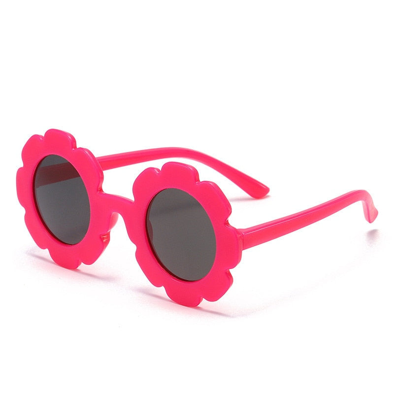 Pink sunflower kids sunglasses for your little diva. These sunglasses are perfect for kids ages 3 to 9 years.