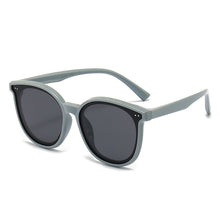 Load image into Gallery viewer, Cool grey polarized sunglasses for you kid age 3 to 9 years. These kids sunglasses come in orange, green, blue, black and grey.
